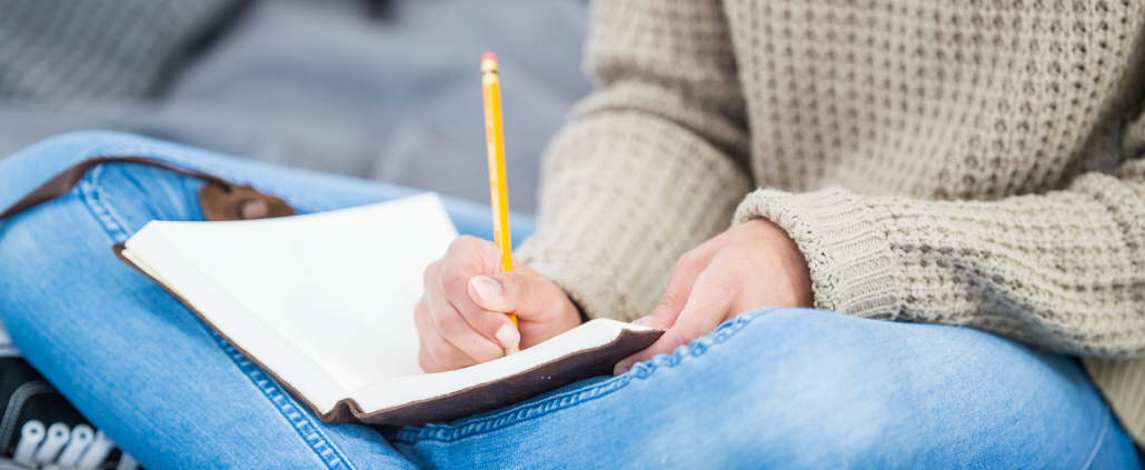 Female counsellor journalling